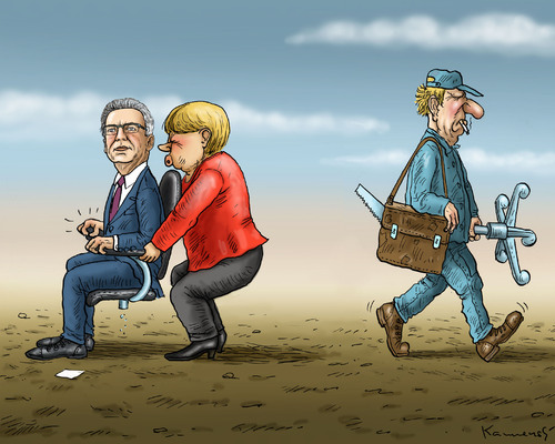 Merkel hält De Maiziere fest Merkel hält De Maiziere fest