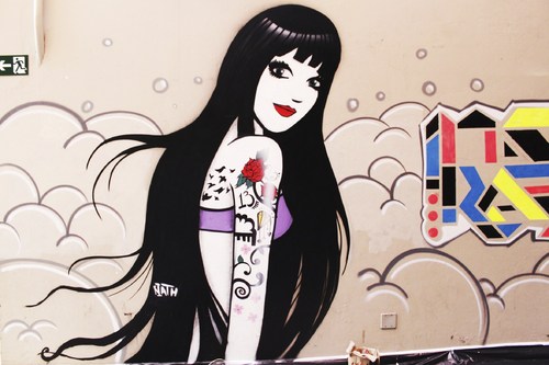 Cartoon: tattoo girl on the wall (medium) by naths tagged graffiti,tattoo,girl