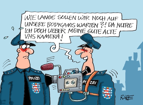 Cartoon: Bodycam (medium) by RABE tagged polizei,demo,demonstrationen,kundgebungen,polizeieinsätze,polizeigewalt,linke,rechte,klimaschützer,thüringen,rabe,ralf,böhme,cartoon,karikatur,pressezeichnung,farbcartoon,tagescartoon,polizeigewerkschaft,bodycam,vhs,videokamera,recorder,camcorder,polizei,demo,demonstrationen,kundgebungen,polizeieinsätze,polizeigewalt,linke,rechte,klimaschützer,thüringen,rabe,ralf,böhme,cartoon,karikatur,pressezeichnung,farbcartoon,tagescartoon,polizeigewerkschaft,bodycam,vhs,videokamera,recorder,camcorder