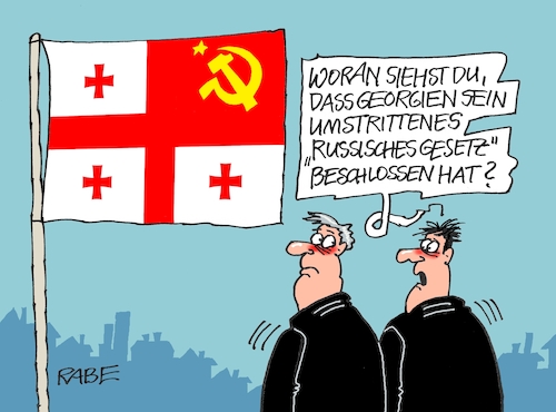 Cartoon: Georgien Zwei (medium) by RABE tagged georgien,russland,putin,gesetz,flagge,baerbock,rabe,ralf,böhme,cartoon,karikatur,pressezeichnung,farbcartoon,tagescartoon,moskau,republik,hammer,sichel,stern,russlandflagge,abstimmung,parlament,georgien,russland,putin,gesetz,flagge,baerbock,rabe,ralf,böhme,cartoon,karikatur,pressezeichnung,farbcartoon,tagescartoon,moskau,republik,hammer,sichel,stern,russlandflagge,abstimmung,parlament