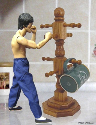 Cartoon: bruce lee (medium) by tanerbey tagged holder,cup,dummy,trainning,lee,bruce