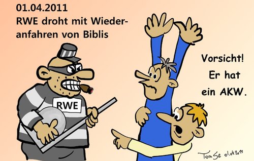 Cartoon: Vorsicht - Er hat ein AKW (medium) by TomSe tagged akw,raub,überfall,erpressung,nötigung,rwe,atomkraf,ausstieg