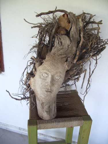Cartoon: facewood (medium) by necmi oguzer tagged statuette,sculpture,wood,women,holzsculpture