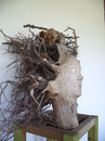 Cartoon: facewood (small) by necmi oguzer tagged sculpture,wood