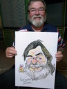 Cartoon: portrait (small) by necmi oguzer tagged live