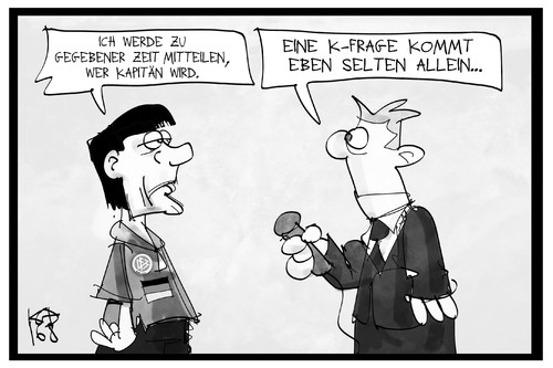 Cartoon: Löws K-Frage (medium) by Kostas Koufogiorgos tagged karikatur,koufogiorgos,illustration,cartoon,frage,kapitän,reporter,journalist,bundestrainer,entscheidung,interview,sport,fussball,spielführer,karikatur,koufogiorgos,illustration,cartoon,frage,kapitän,reporter,journalist,bundestrainer,entscheidung,interview,sport,fussball,spielführer