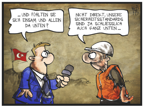 Cartoon: Türkische Sicherheitsstandards (medium) by Kostas Koufogiorgos tagged karikatur,koufogiorgos,illustration,cartoon,tuerkei,kumpel,bergbau,mine,bergarbeiter,bergwerk,sicherheit,standard,reporter,medien,presse,interview,arbeiter,arbeit,arbeitsbedingungen,karikatur,koufogiorgos,illustration,cartoon,tuerkei,kumpel,bergbau,mine,bergarbeiter,bergwerk,sicherheit,standard,reporter,medien,presse,interview,arbeiter,arbeit,arbeitsbedingungen